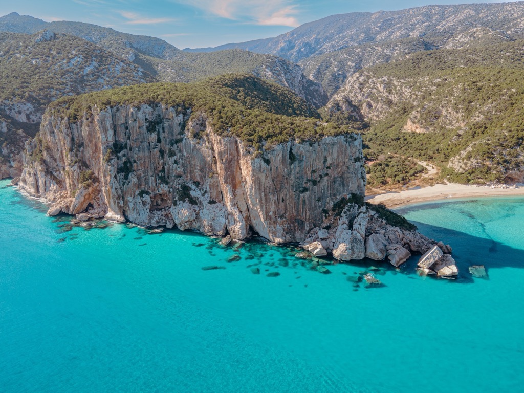 Cala Luna beach and its surrounding limestone cliffs at Cala Gonone, Sardinia