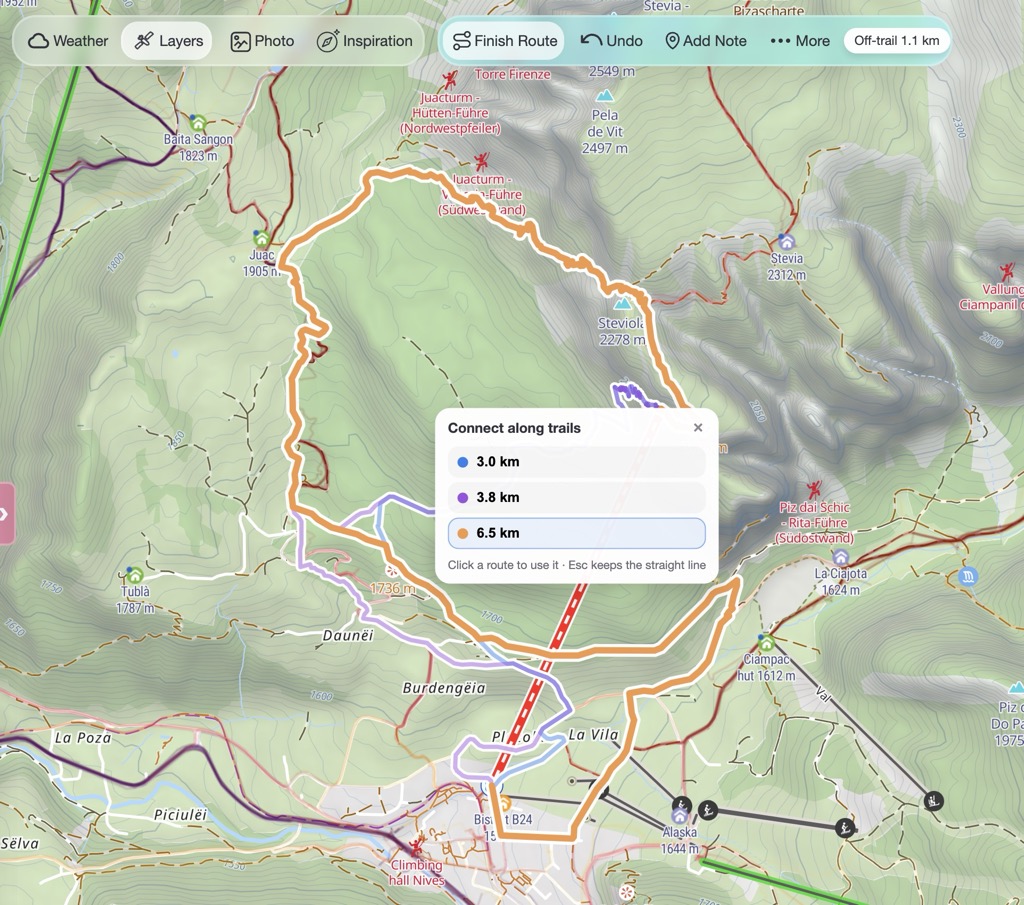 Three suggested routes between two points, shown as coloured preview lines