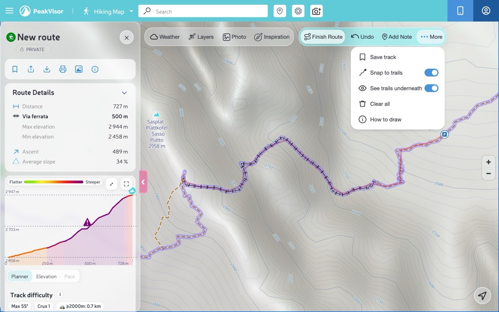 The planned route faded so the via ferrata underneath shows through, with See trails underneath switched on in the More menu