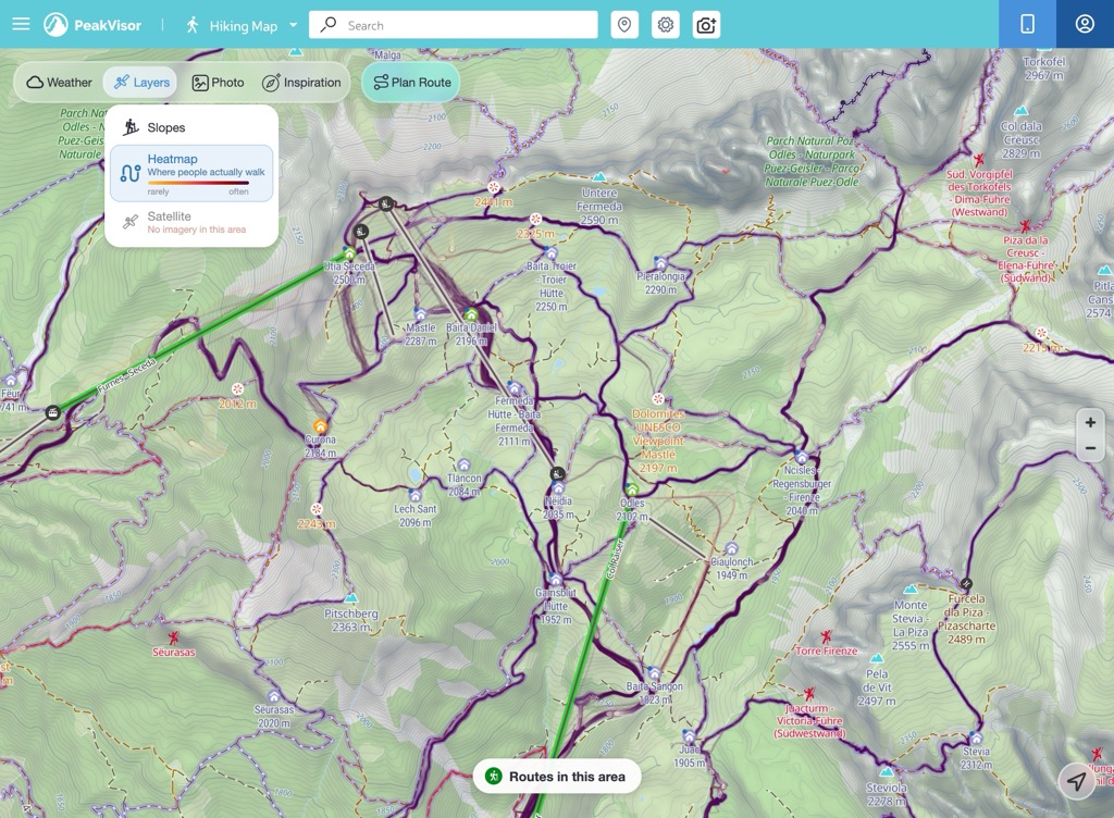 The Layers menu on the hiking map with Heatmap switched on, above Seceda in the Dolomites