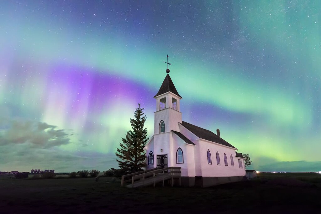 Aurora Borealis over historic Church in Saskatchewan