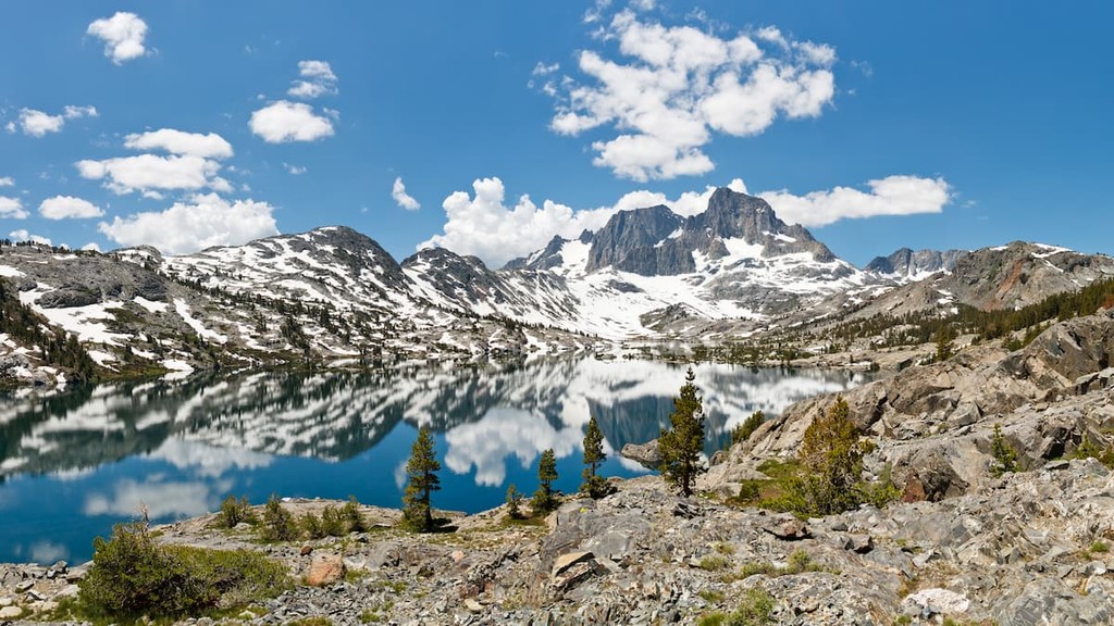 Stunning Alpine Lake Scenery. Banner Peak towering above Garnet Lake in the Ansel Adams Wilderness. Ritter Range