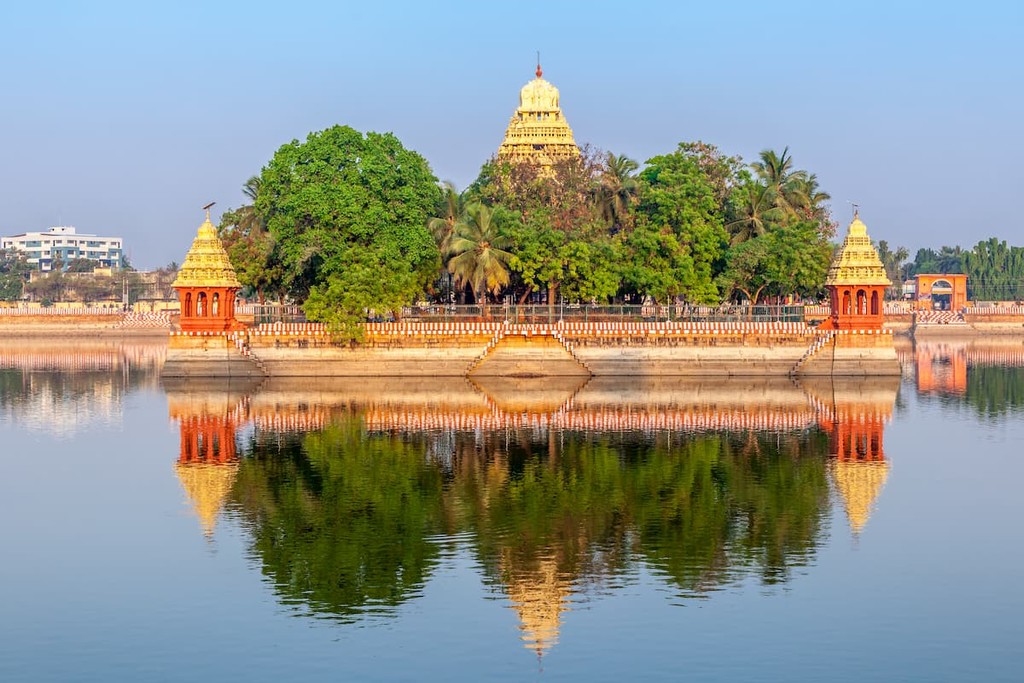 Traditional Hindu temple on lake, Tamil Nadu, India